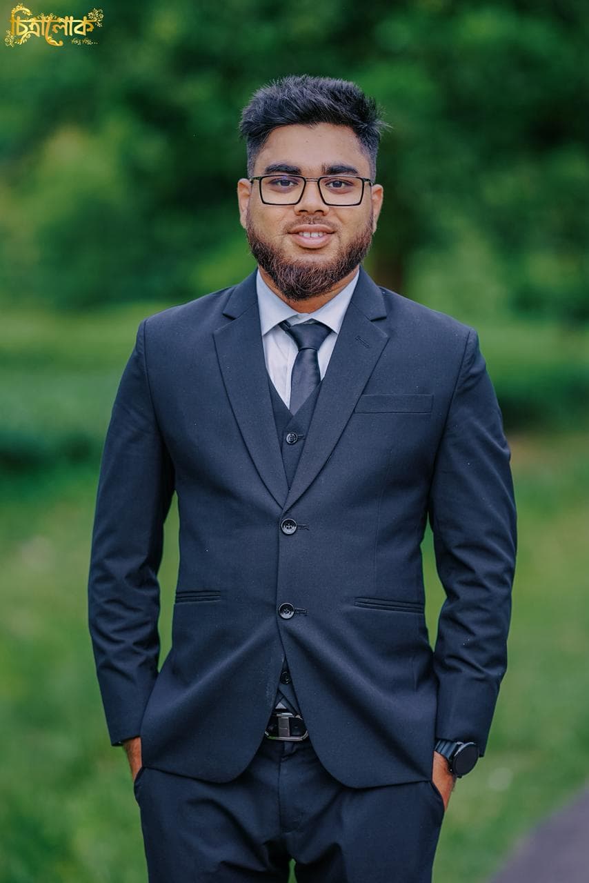 Chairman and Managing Director of SoftEdge Technology Ltd — portrait in formal attire